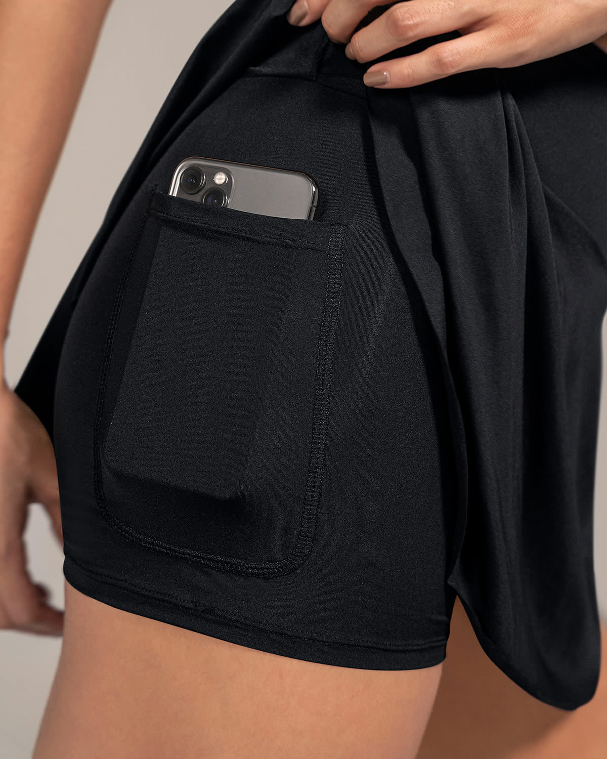 Falda deportiva con short interno con bolsillo - Image 10